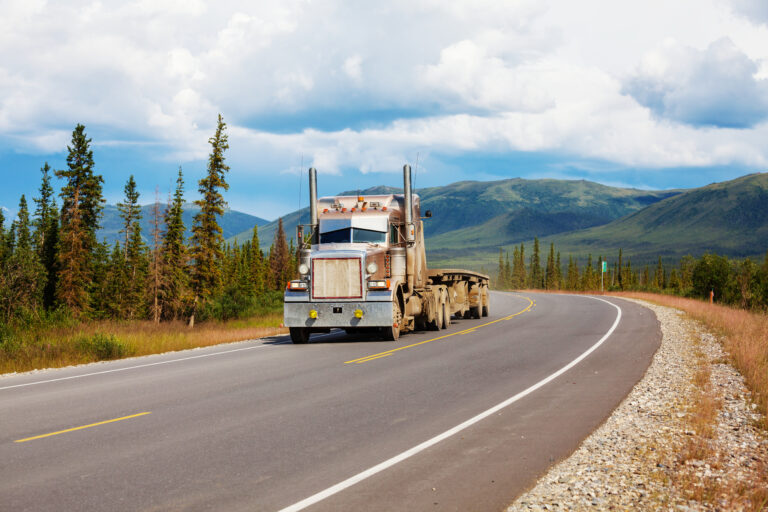 Mountain Shadow Transport offers flat deck trucking services in BC, Alberta, Saskatchewan and beyond